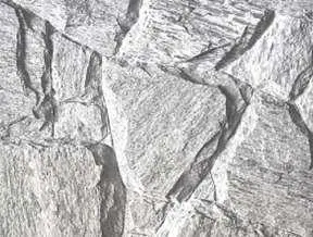 Muro de divisa em pedra natural